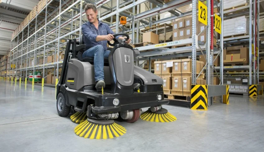 Janitorial crew cleaning an industrial warehouse facility in Harrisburg PA